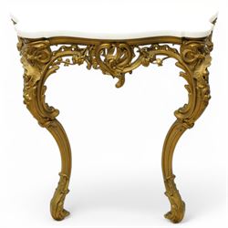 Late 19th to early 20th century giltwood and gesso console table with marble top, shaped white marble top, the base with pierced front decorated with shells and trailing leafy branches with flower heads, on cabriole supports with shell decorated knees, scrolled feet with acanthus leaf terminals 