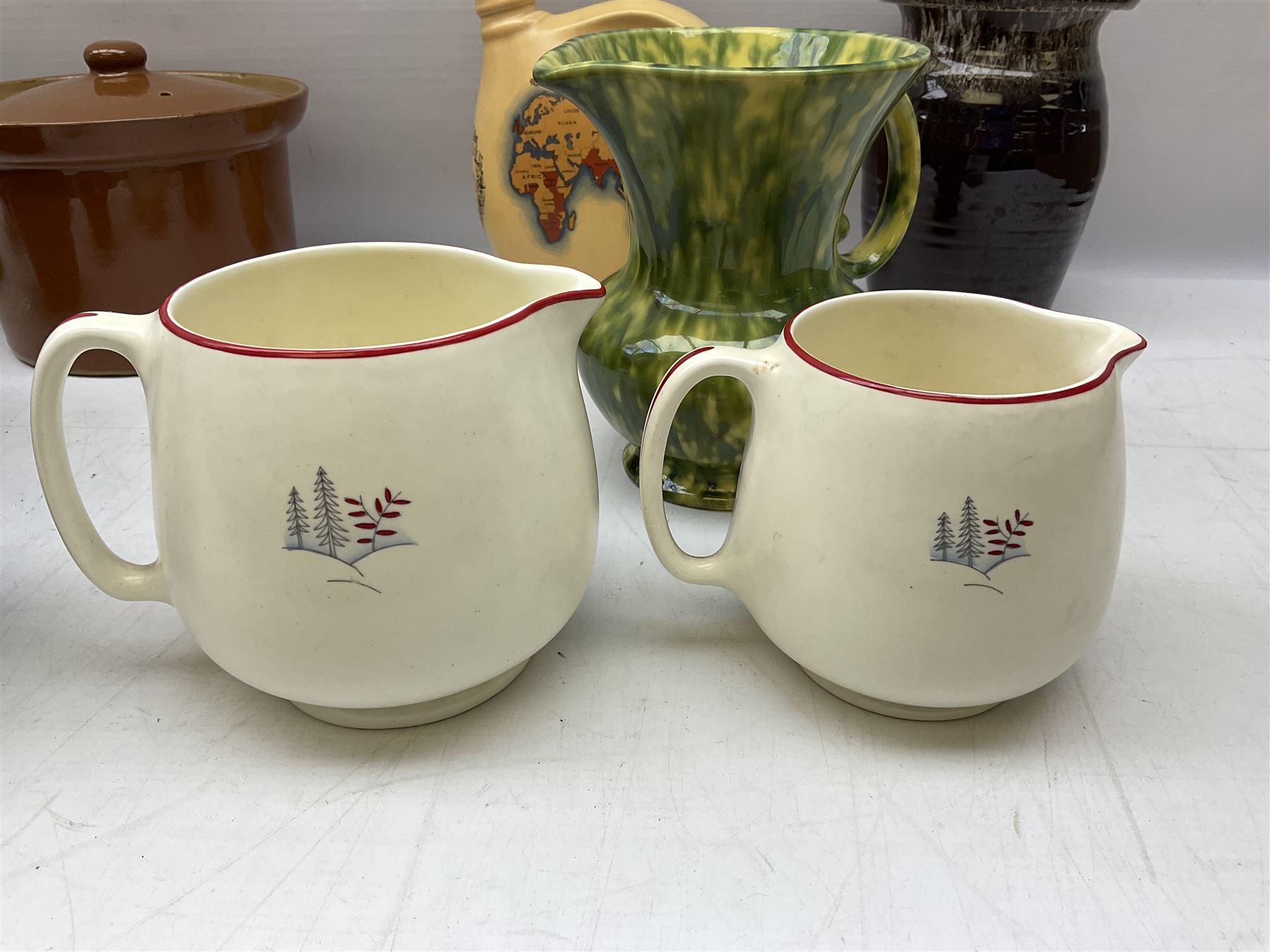 Mid century Spode Copeland 'Cutie Kitten' bowl, Crown Ducal King George VI and Queen Elizabeth Coronation Emu Wines flask with stopper, c1937, Carlton Ware sauce boat and saucer, Crown Devon and quantity of ceramic jugs etc