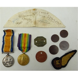  WWI medal pair - British War and Victory medals, awarded to '22368. 2 . A.M. N. MITCHELL. R.A.F.' an Air Force Engineer brevet, two British Armed Forces bakelite 1d tokens and two 1/2d token, two R.A.F. tags 'Mitchell, 1686222' and a signed piece of fabric (8)  