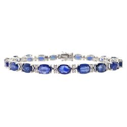 Platinum oval sapphire link bracelet, with two diamond accents set between each sapphire, stamped PT 950, total sapphire weight approx 19.50 carat