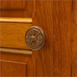 Beaverman - Yorkshire oak panelled double wardrobe, with carved pediment, panelled doors and sides, with internal top shelf above a single hanging rail, with carved beaver signature, by Colin Almack of Sutton near Thirsk