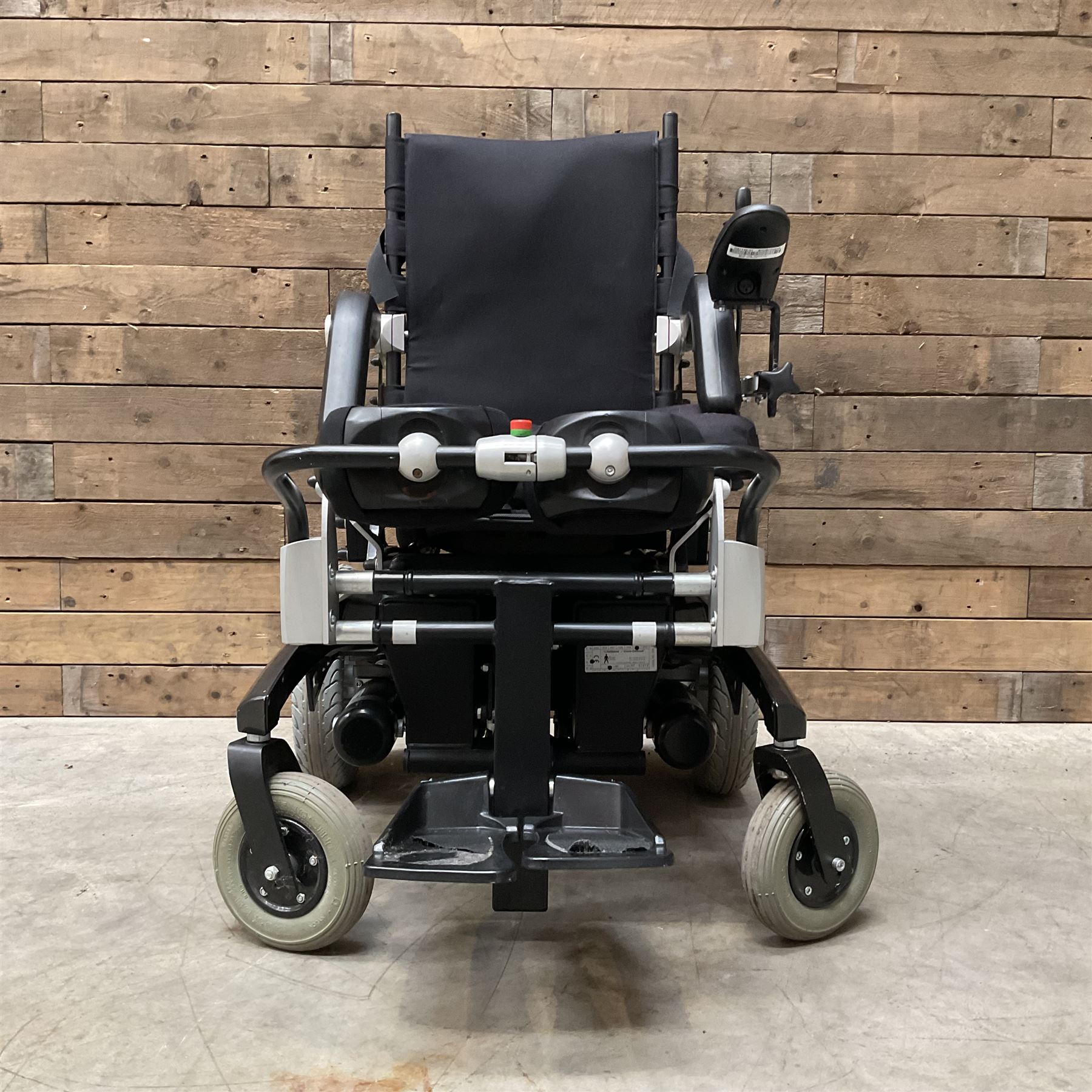 Permobil LSA Lifestand seated and standing wheelchair