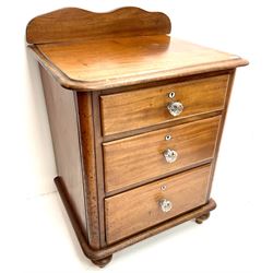 Victorian mahogany pedestal chest, raised shaped back, moulded top, three graduating drawers, turned supports 