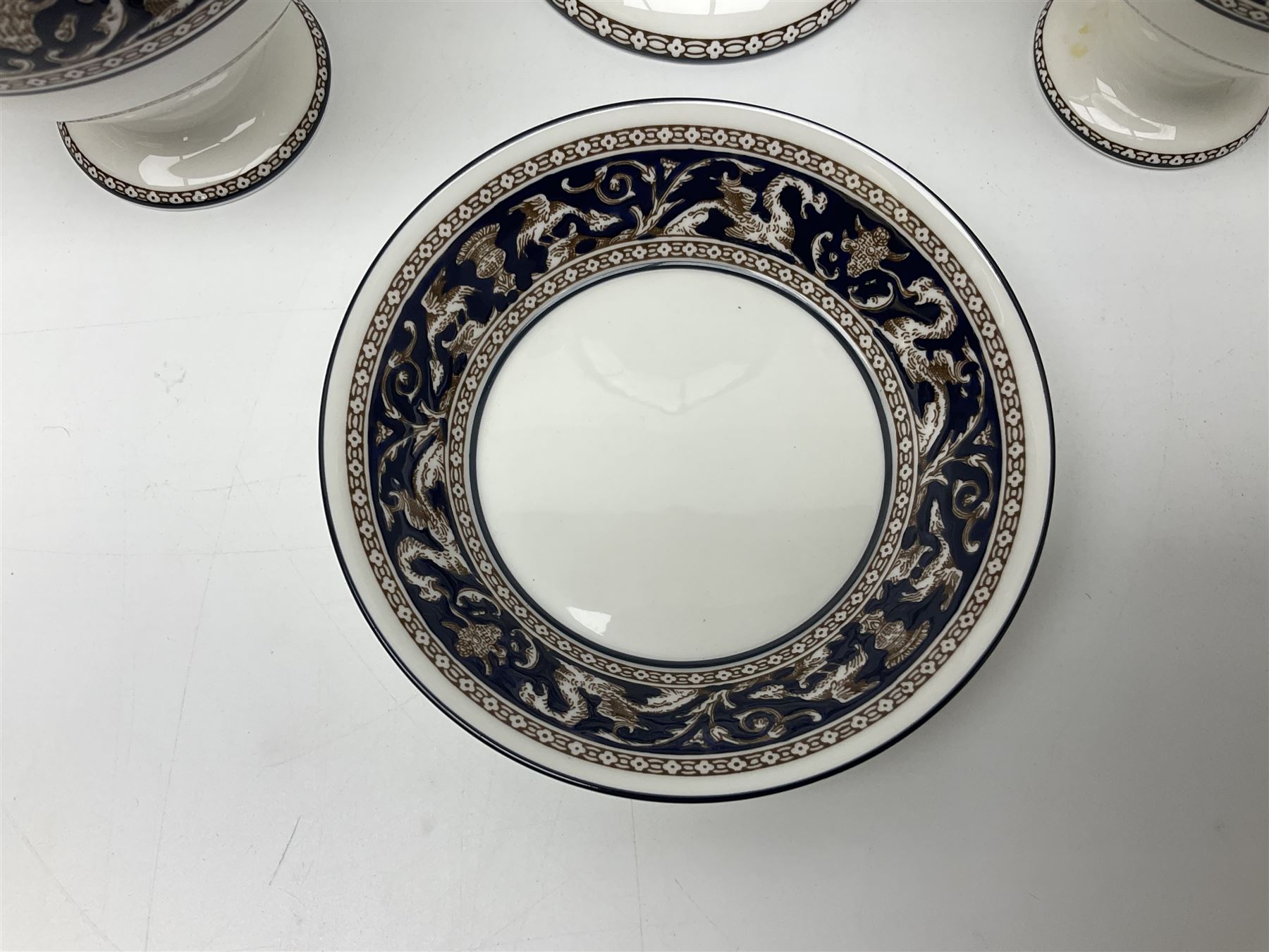 Wedgwood navy Florentine pattern coffee service for six, comprising coffeepot, coffee cans and saucers, milk jug, twin handled covered sucrier and small dish