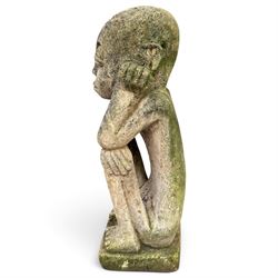 Balinese design weathered cast stone figure of an ancestral guardian, modelled in a squatting pose 