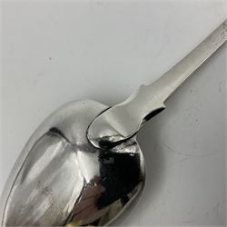 George III Exeter silver Fiddle pattern serving spoon, the terminal engraved with crest of a fist holding an arrow, hallmarked George Turner, Exeter 1816, L29cm