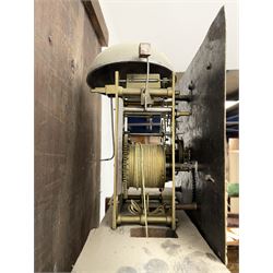 19th century carved oak longcase clock, projecting cornice over guilloche carved frieze, square brass dial with silvered Roman chapter ring and calendar aperture, decorated with ornate mask cast spandrels, the trunk door and base carved with potted plant, twin train driven eight day movement striking on bell