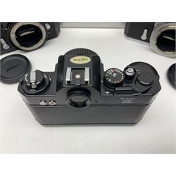 Nikkormat FT2 camera body, serial no. 5066813, in original packaging, together with Nikkormat EL camera body, serial no. 5577358, with Nikon Nikkor 50mm 1:1.8' lens no. 2143575, Nikkormat FT, serial no. 3968385, and Nikomat FT camera body, serial no. 4015491