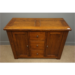  Oak sideboard, three drawers flanked by two cupboards enclosing shelves, square supports, W110cm, H81cm, D50cm  
