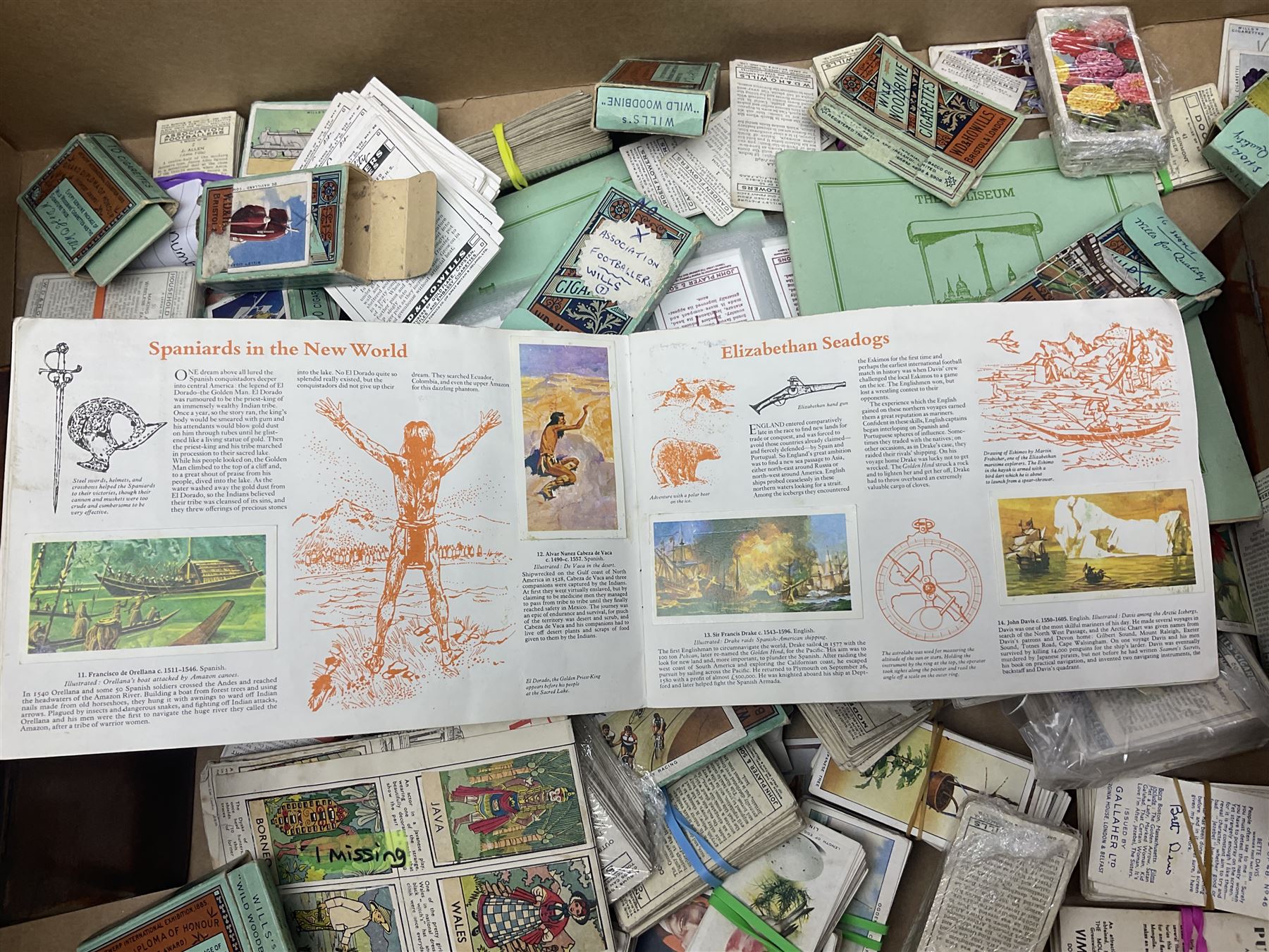 Floral tapestry in a mahogany frame, large collection of cigarette cards, framed tapestry, small microscope and a wooden correspondence box, frame H66cm