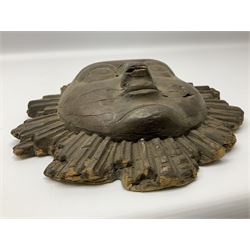 Carved pine mask of the sun, probably late 17th/early 18th century, originally a cresting, bearing Christie's lot labels, D20cm

Provenance 
Lot 161, Christopher Howe - The First Twenty Years, Christie's. 24th March 2004

