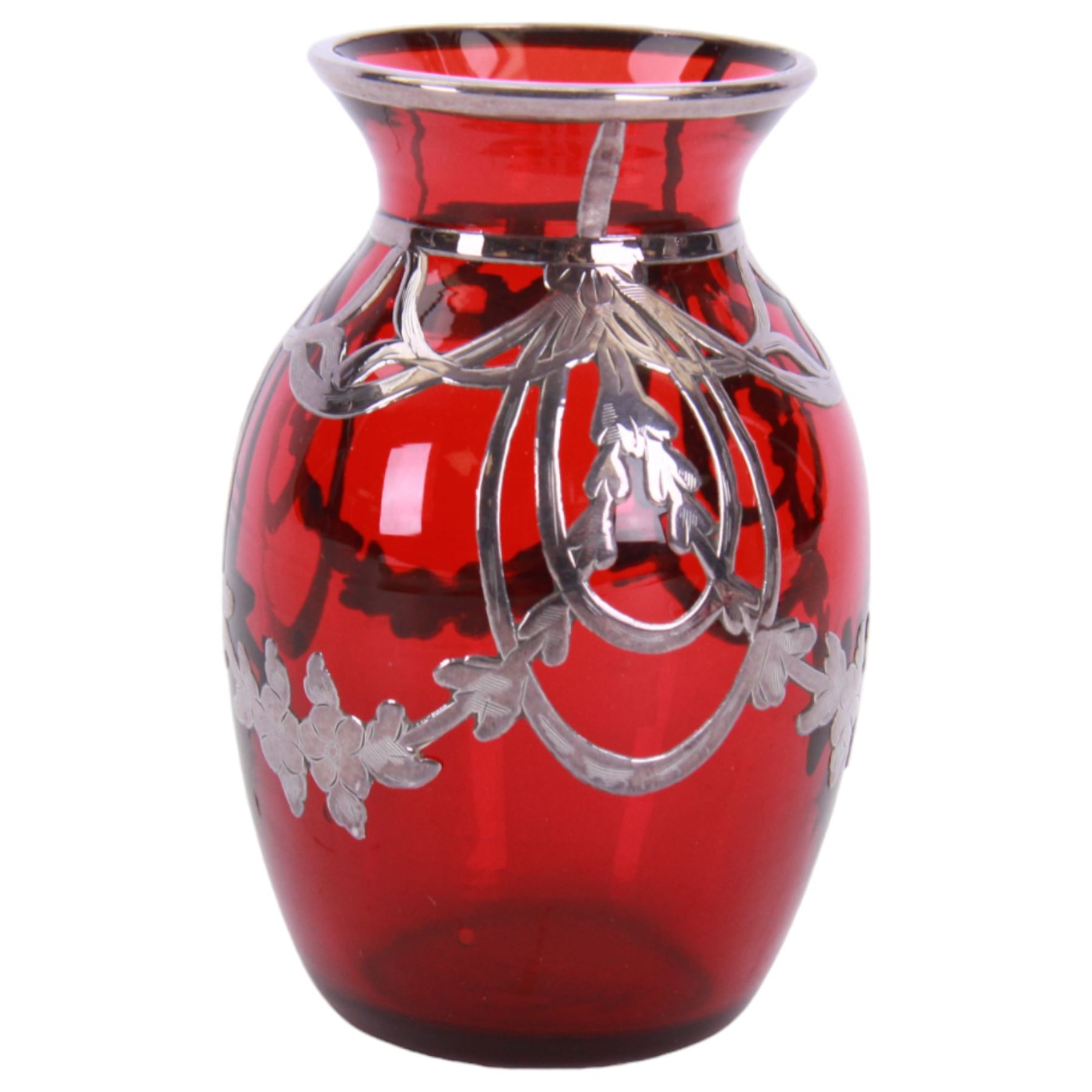 Early 20th century, ruby glass vase vase, with silver overlay of flower swags, impressed sterling H9cm, together with a similar wall vase H21cm,  