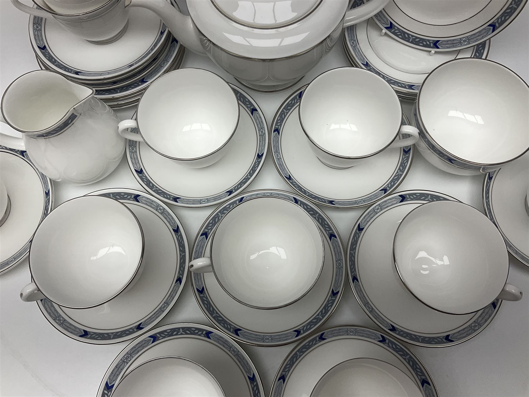 Royal Worcester Beaufort tea service, comprising teapot, milk jug, open saucier, eleven teacups, twelve saucers, eight dessert plates and one cake plate