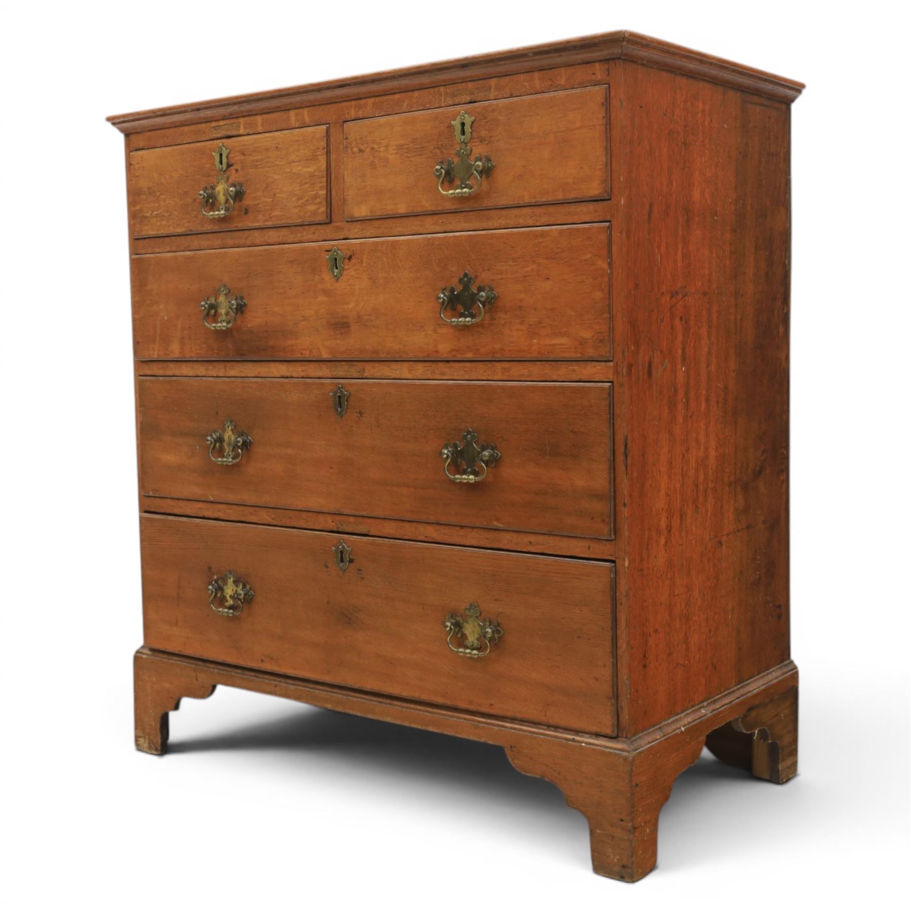18th century oak chest, moulded rectangular top, above two short over three long graduating drawers, fitted with pierced brass escutcheons and swan neck handles, on bracket feet 