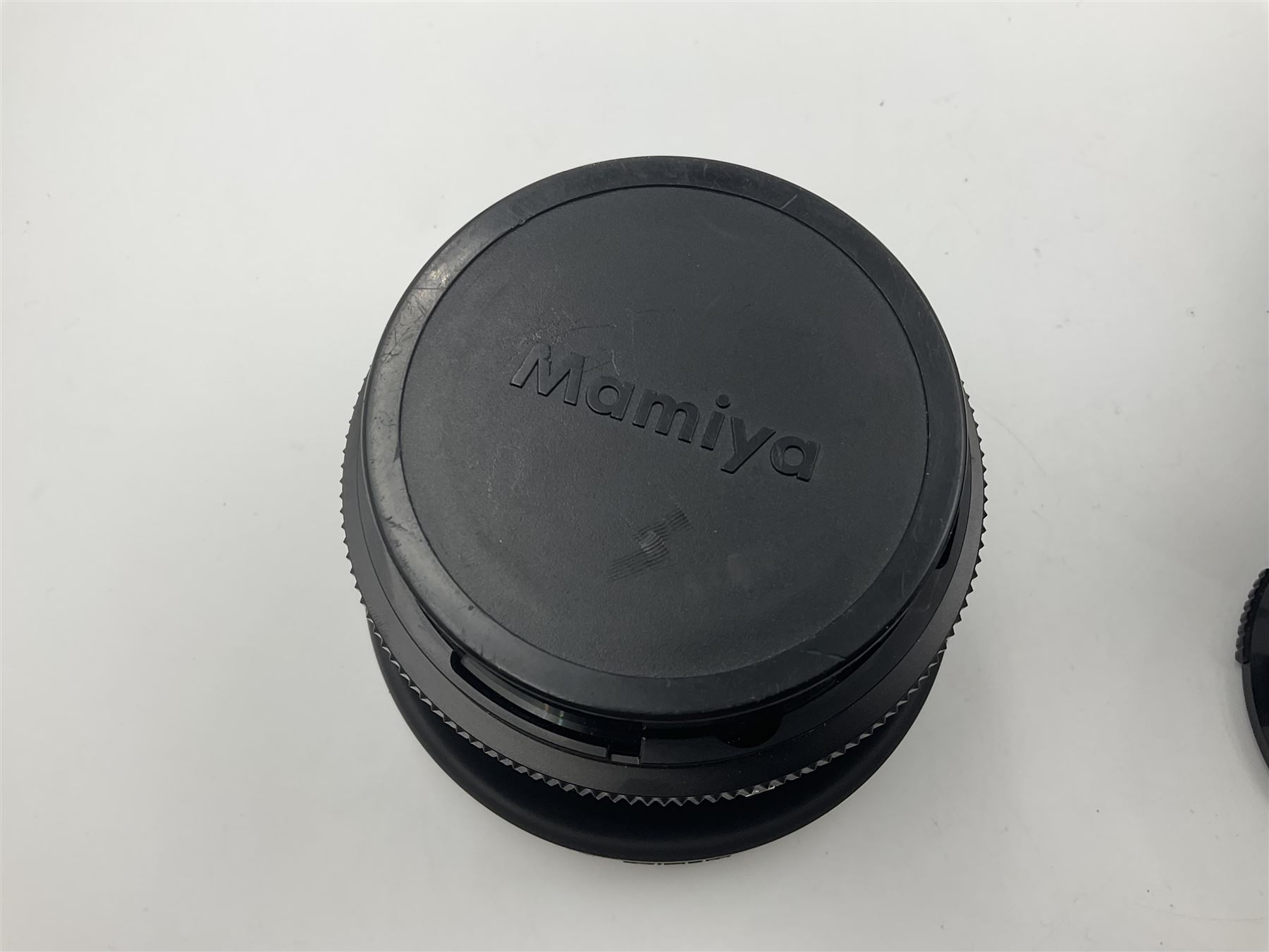 Seiko 'Mamiya Macro M 1:4.5 f=140mm M/L-A' lens serial no 003593 and Seiko 'Mamiya-Sekor Z f=110mm 1:2.8W' lens, serial no 56560