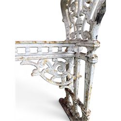 Victorian ornate cast iron garden table, trefoil base with central enclosed column, circular top with later marble, with registration mark