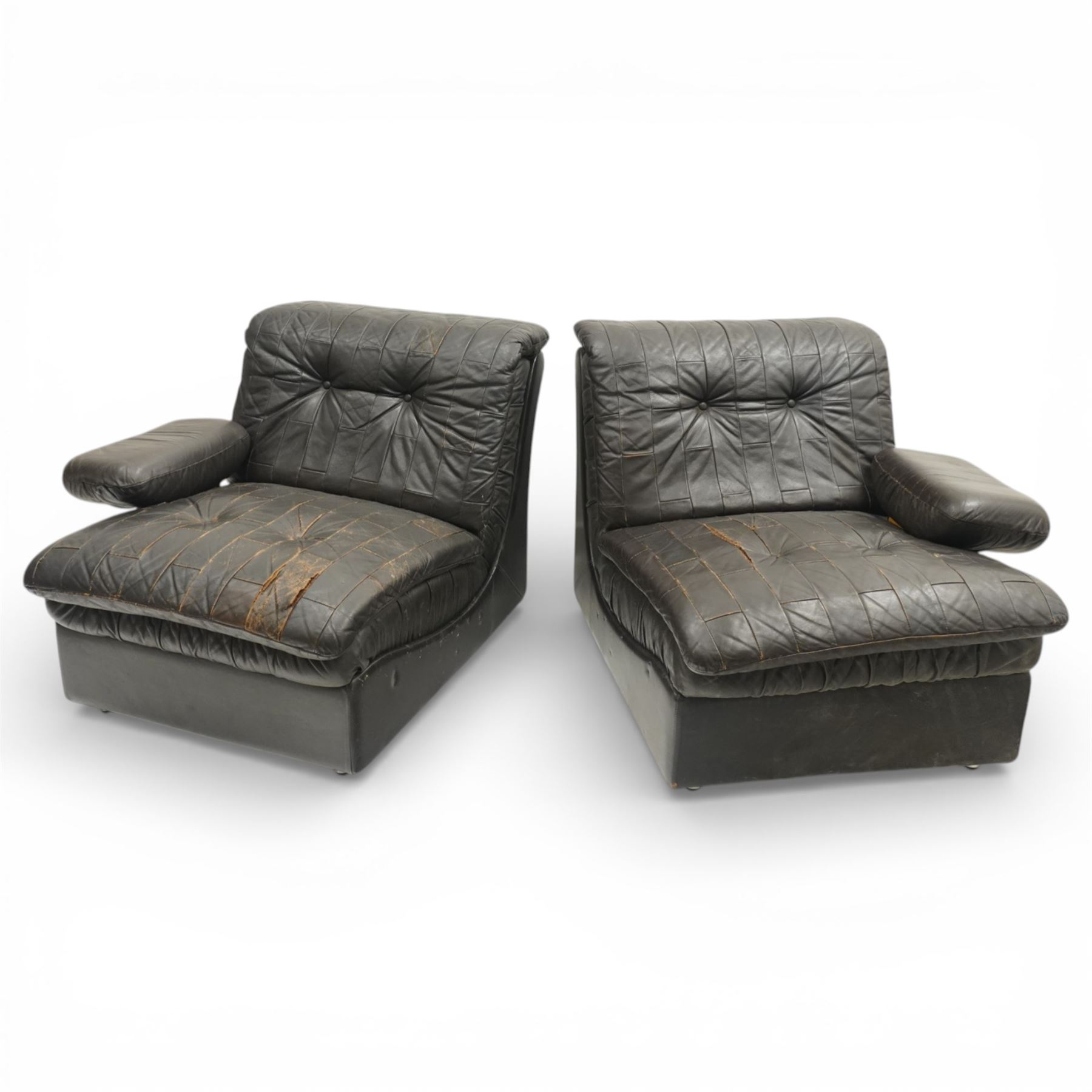 Mid 20th century leather upholstered two-piece sectional sofa with footstool, buttoned back cushions with stitched panel decoration, padded armrests and deep seat cushions, raised on concealed supports