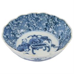 Collection of Japanese and similar ceramics, including pair of Satsuma side plates, decorated with a crowd of figures, blue and white teapot with floral decoration, blue and white vase and plates, etc