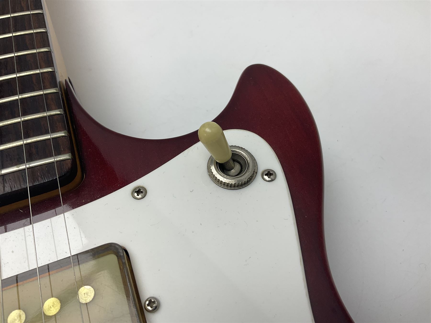 Gibson Marauder style six-string electric guitar with cherry coloured body, marked made in Japan L101cm; in locking hard carrying case