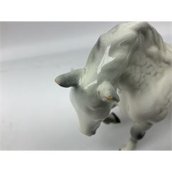 Collection of Beswick horses, including grey horse no.701, palomino foal no 836, grey stocky jogging mare no.855 etc, together two Royal Doulton horses, (8)