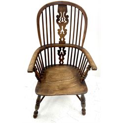 19th century Yorkshire yew and elm Windsor chair, scrolling arms, turned supports joined by crinoline stretchers 