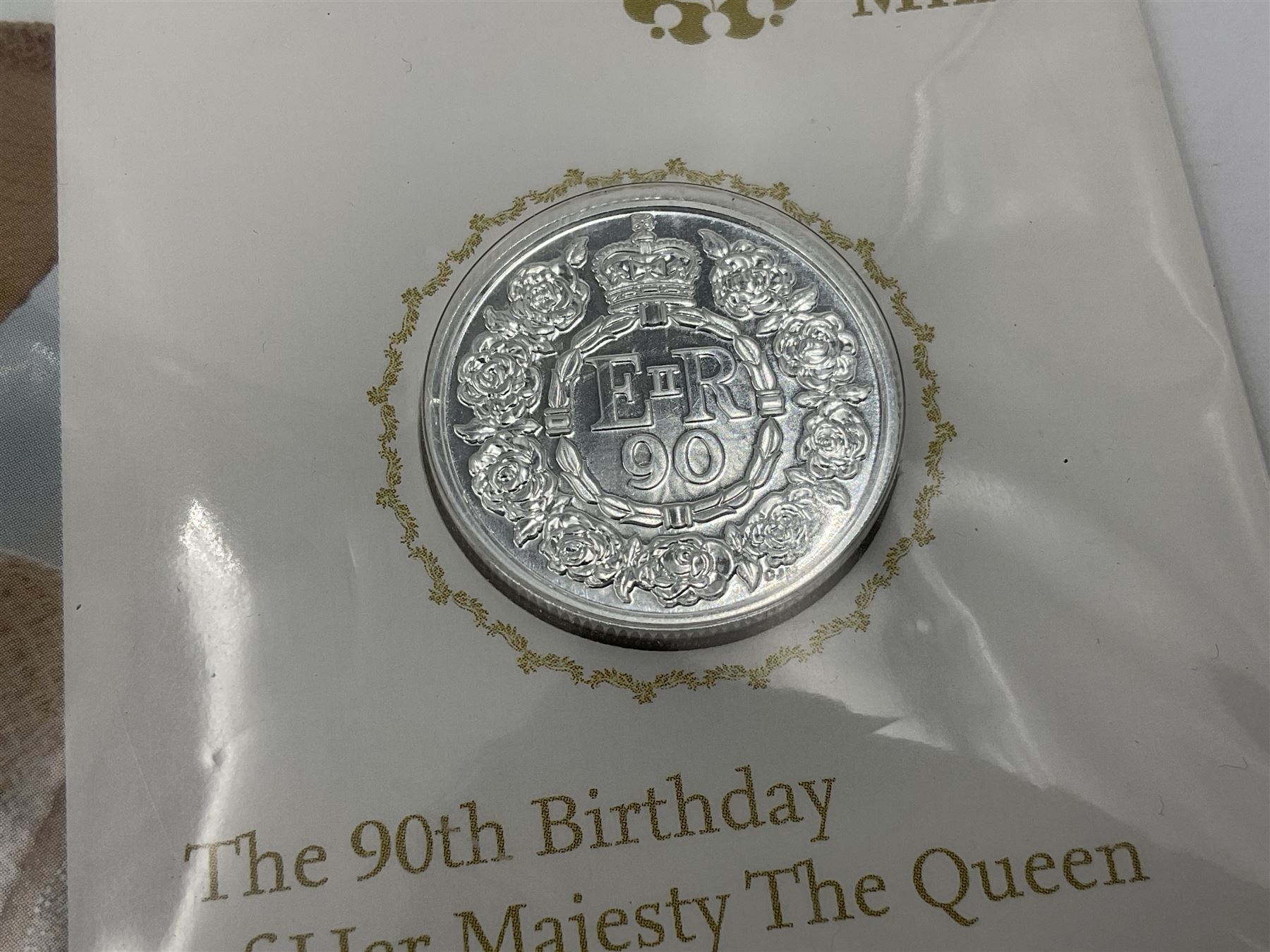Three The Royal Mint United Kingdom fine silver twenty pound coins, comprising 2014 'Outbreak', 2015 'The Longest Reigning Monarch', 2016 'The 90th Birthday of Her Majesty the Queen', all on cards