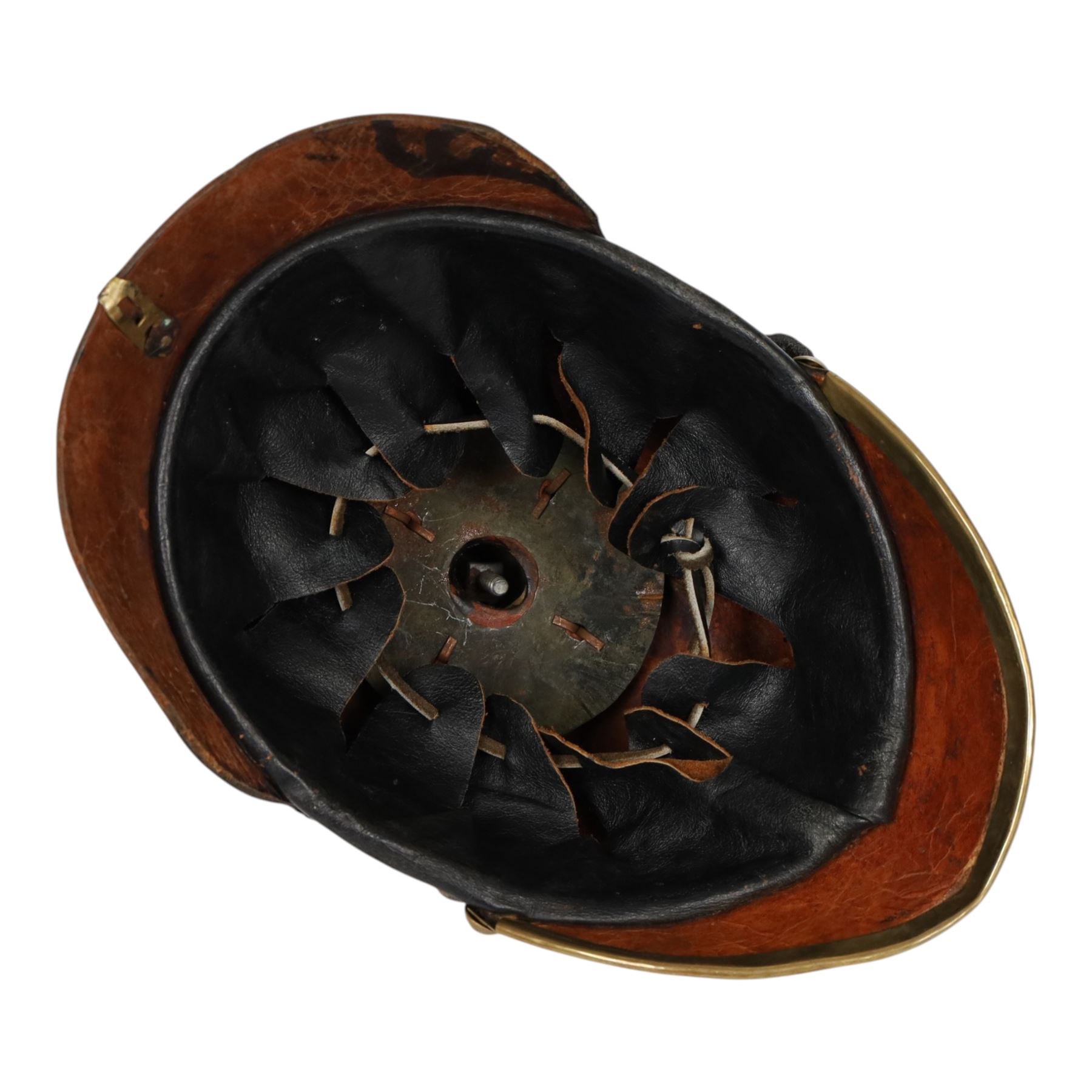 WWI Prussian guard regiment Pickelhaube, the black leather skull with brass ball finial, brass eagle helmet plate and leather chin strap, one side with a black  and white cockade, the other black, white and red, 