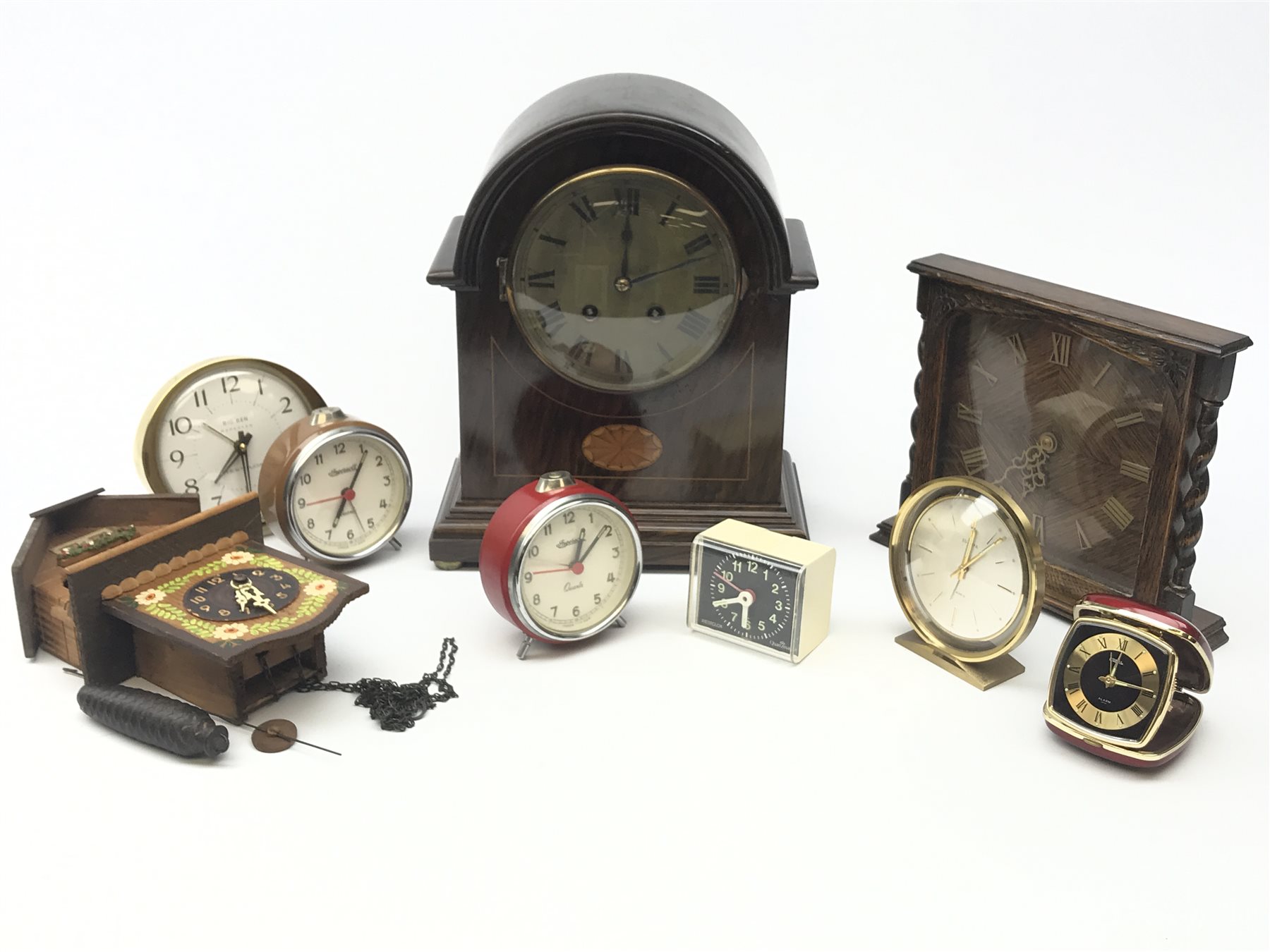 Collection of clocks Early 20th century arched top mantel clock with