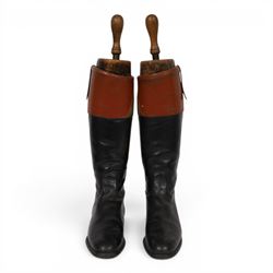 Pair of brown leather topped riding boots, with wooden shoe trees