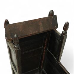 Early 18th century oak cradle dated AD 1710 and late 19th century kitchen chair, the cradle of pegged construction with shaped headboard and turned finials, raised on curved rockers (H 75cm, W 94cm, D 62cm), the chair with spindle back, turned supports and circular seat (H 89cm, W 42cm, D 47cm)