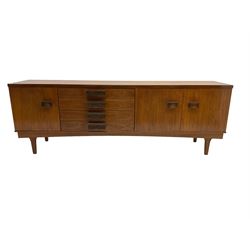 Bath Cabinet Makers BCM - mid-20th century teak sideboard fitted with four drawers and three cupboards with curved handles on tapering supports