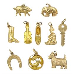 Ten 9ct gold pendant/charms including west highland terrier, pig, horseshoe, elephant, boot and key