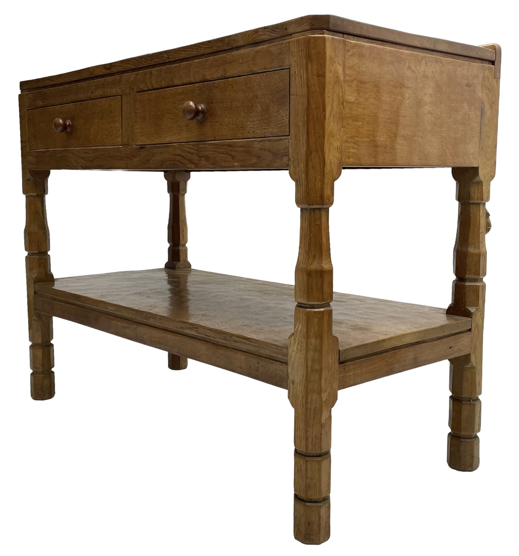Mouseman - circa. 1950s oak serving table, adzed rectangular top over two drawers, on octagonal supports joined by adzed undertier, the rear right leg carved with mouse signature, by Robert Thompson of Kilburn