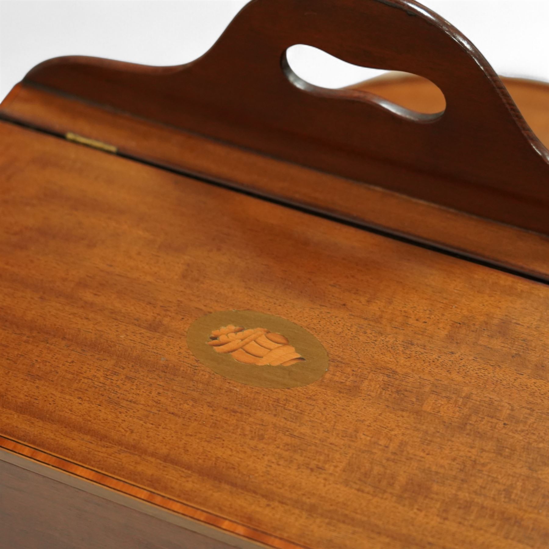 Early 20th century Edwardian mahogany work table, oval top inlaid with satinwood shell motif and stringing, hinged compartment fitted with letter rack and divided interior, on tapering legs with brass castors