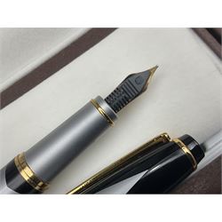 Circa 1930s Mentmore Auto Flow button fill fountain pen, the black barrel and cap with single narrow band and gold nib stamped Osmi Ridium 14ct, together with two gold nib fountain pens, each marked Huahong, the first stamped 14K 580, and second stamped 8K, both housed in Mentmore boxes (3)