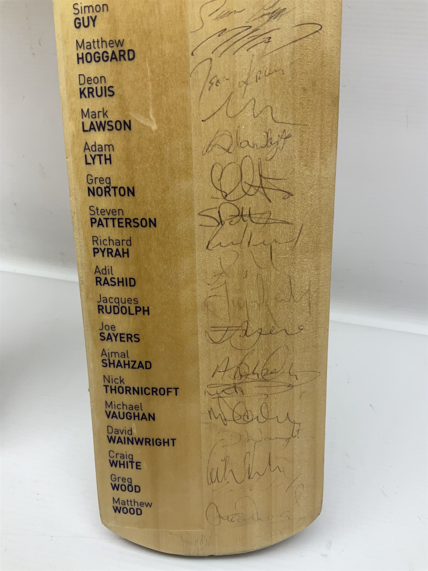 Two signed Yorkshire County cricket bats, from 2007 and 2008 seasons, bearing signatures including Darren Gough, Jason Gillespie, Younus Khan, Michael Vaughn and Tim Bresnan, etc