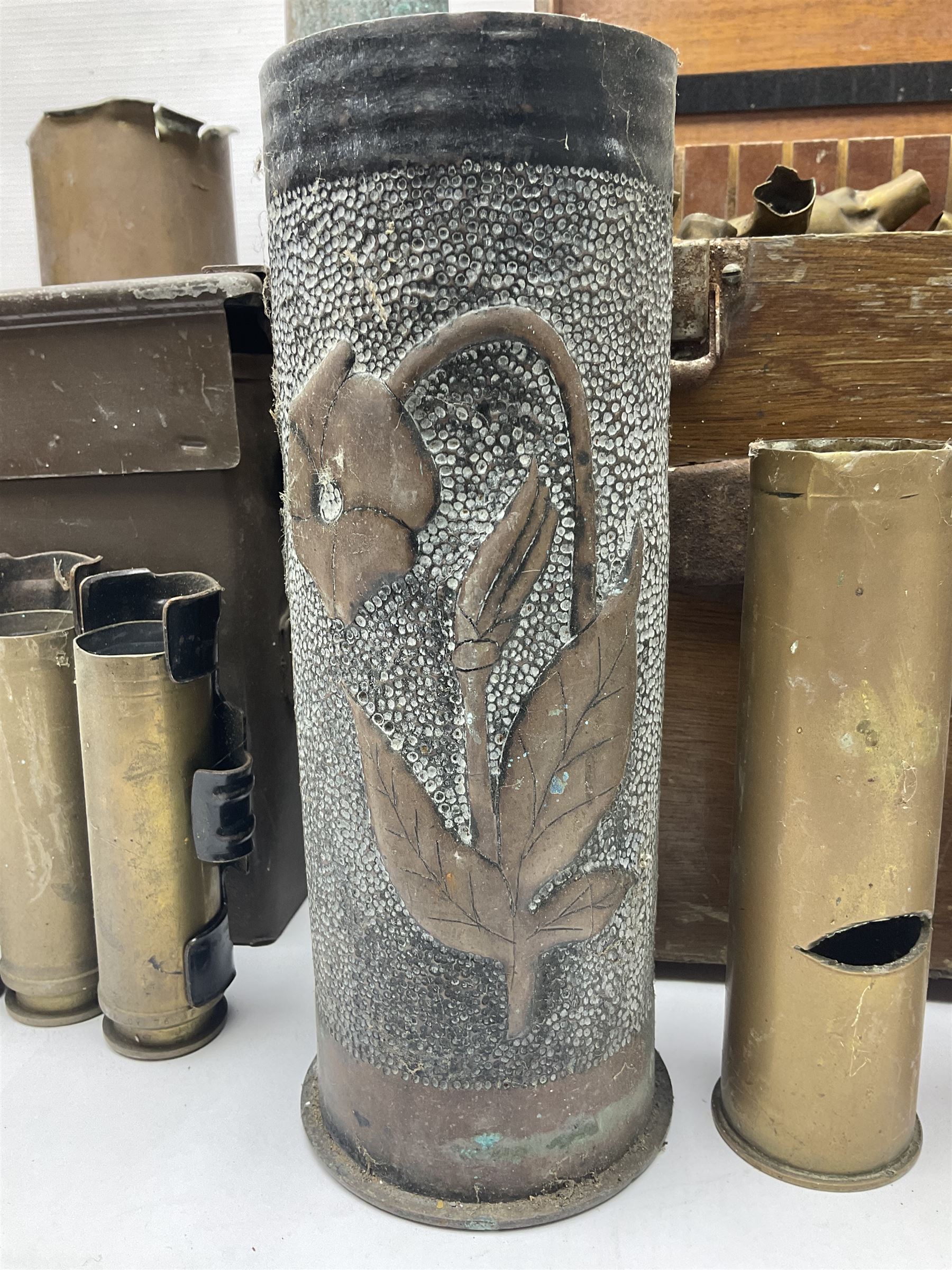 Large collection of shell and bullet casings, including a trench art example, together with a metal cartage case and wooden case