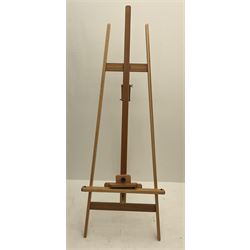 A pine floor standing artists easel, when closed H168cm.
