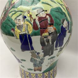 20th century Chinese Famille Rose vase, of baluster form with flared lobed rim and twin figural handles, decorated in polychrome enamel with figures dancing and playing instruments within a garden setting, H42cm