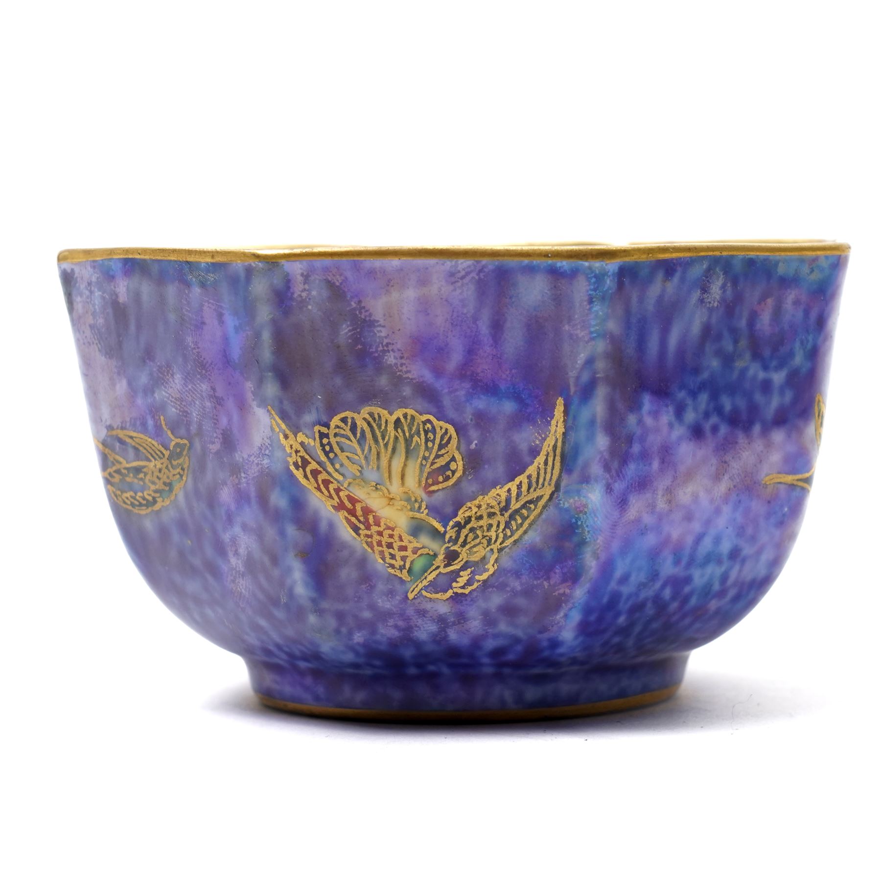 Wedgwood Fairyland lustre bowls, designed by Daisy Makeig-Jones, featuring the Hummingbird and Butterfly patterns, each with gilt stamp and painted pattern numbers Z4832 and Z5294, D10cm and D8.5cm (2)
Notes: please see condition report.