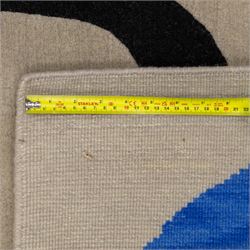 Rugs by Design - ‘Soft Landing’ Nepalese thick pile wool rug, with contemporary abstract design on a taupe ground, decorated with rounded blue forms and a bold black irregular loop motif