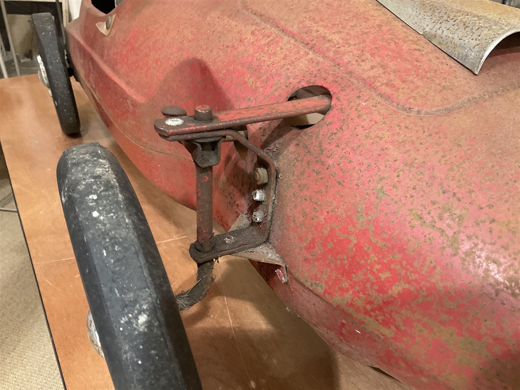 Tri-ang pressed steel Grand Prix Vanwall child’s pedal racing car, English 1960s, finished in red with racing No.3, original white plastic steering wheel, metal bucket seat, bonnet air intake, chrome plated side exhaust, chrome spoked wheels with chrome plated spinners, black solid rubber tyres L121cm W53cm H46cm)