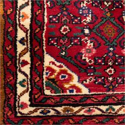 North west Persian hand-knotted Malayer runner, vibrant rose field with an all-over lattice design of lozenges and stylised floral motifs, ivory spandrels within a zig-zag main border flanked by multiple guard stripes 