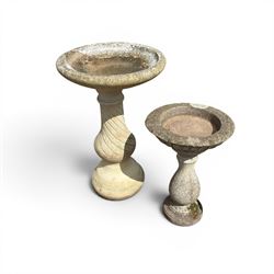 Large cast stone bird bath, circular bowl on spiral column; and a small three piece bird bath (2)