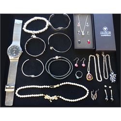 Collection of jewellery including four silver bangles, Skagen watch, Pandora rope necklace, Swarovski pendant necklace with interchangeable pendants, imitation pearl necklace with silver gilt clasp, and silver stone-set jewellery to include two pendant necklaces, three pairs of earrings and a ring