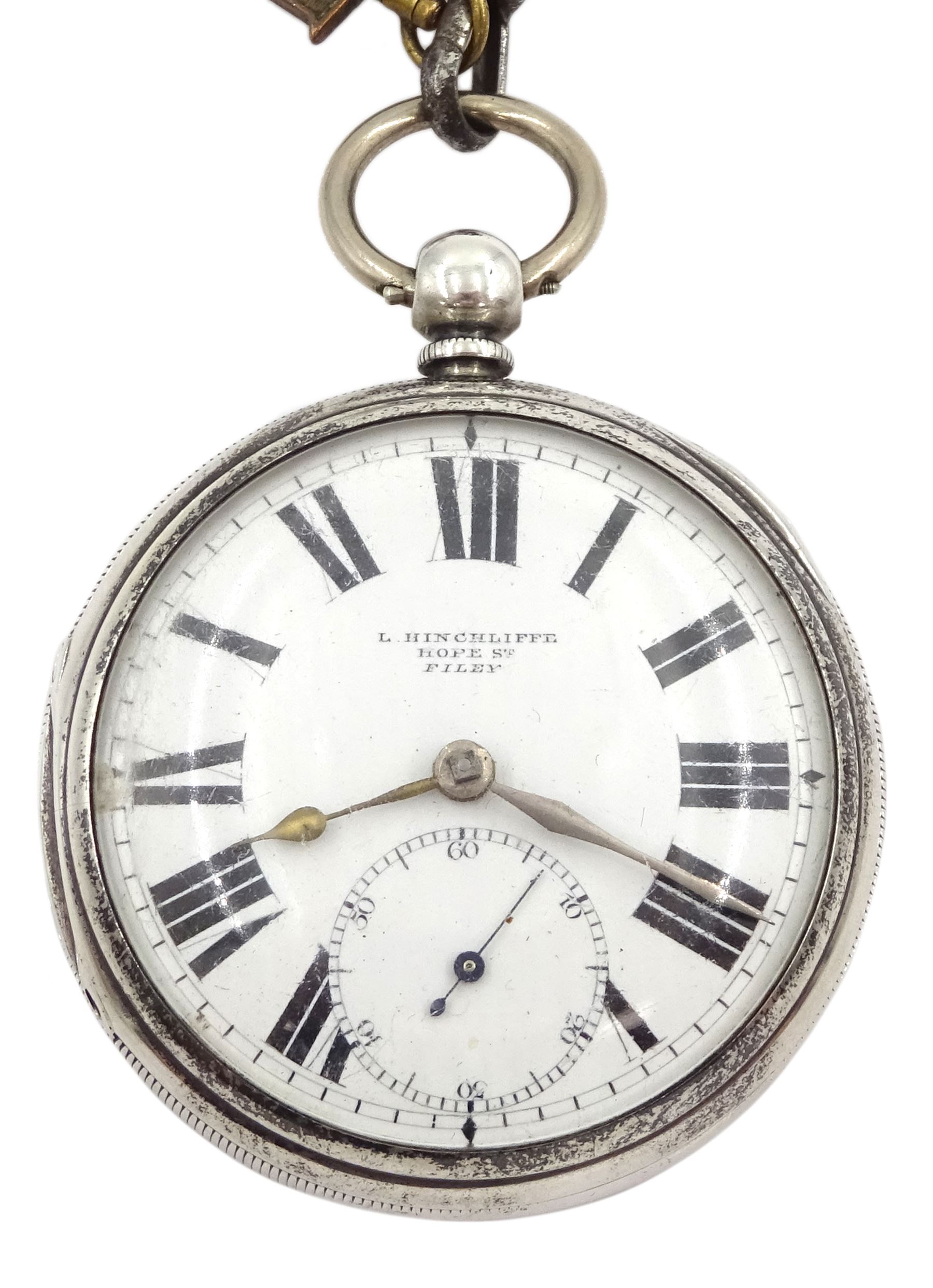Victorian silver open face key wound lever pocket watch by L. Hinchcliffe, Hope Street, Filey, No. 67874, white enamel dial with Roman numerals and subsidiary seconds dial, case by Samuel Yeomans, Chester 1893, on white metal Albert chain with silver fob