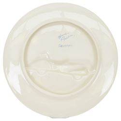 Lorna Bailey prototype charger, decorated with a race car in relief within bright stylised landscape, signed verso, D34.5cm