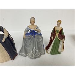 Four limited edition Franklin Mint figures of queens comprising Elizabeth I, Isabella of Spain, Catherine the Great and Marie Antoinette