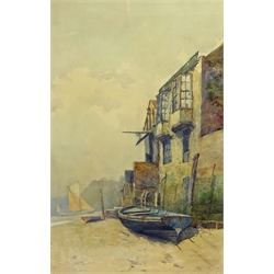  Ernest Dade (Staithes Group 1868-1935): Beached Coble, watercolour signed and dated '86, 43cm x 28cm  