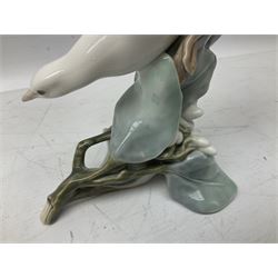 Lladro figure modelled as white dove perched upon a branch